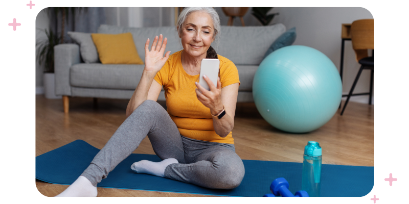 Older woman following on-demand exercises at home