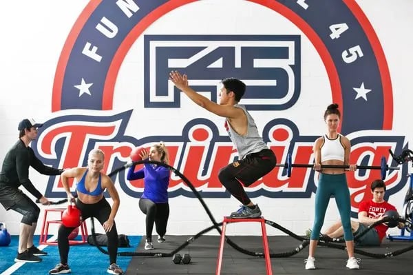 People working out at an F45 Training franchise.