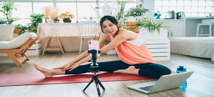 A personal trainer leading an online PT session