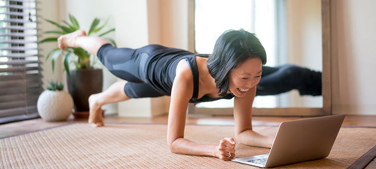 A woman enjoying an online class