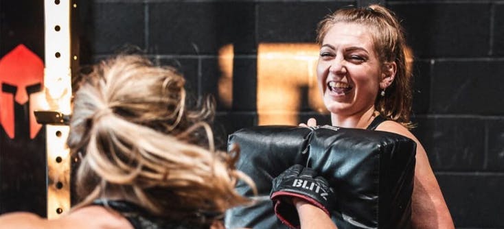 two spartan chamber customers females boxing