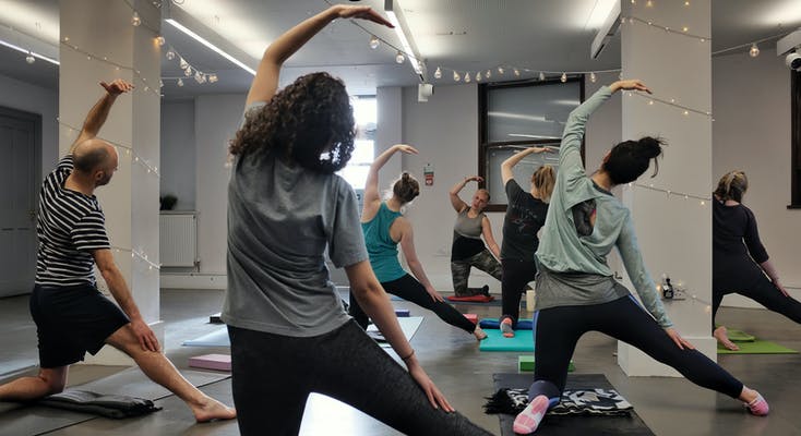 Lucy Bannister teaching a yoga class