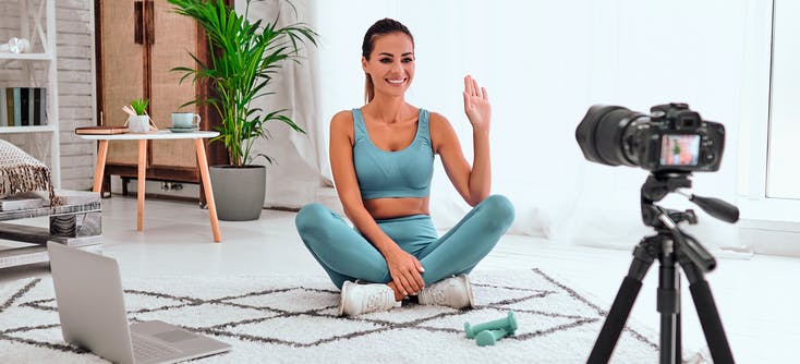 girl filming an on-demand fitness video