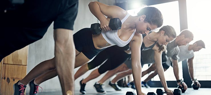 group workout class with dumbbells