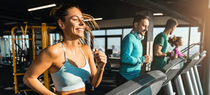 image of people at the gym running on the treadmill