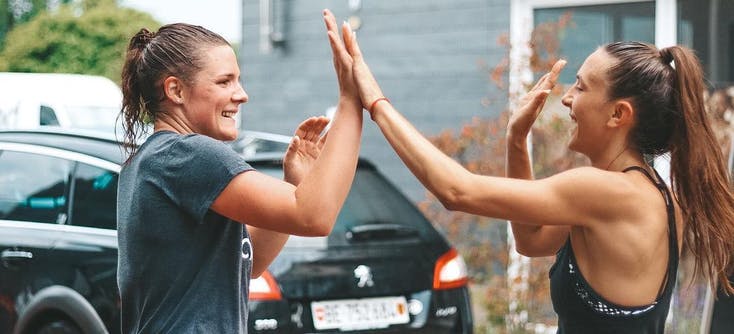 two girls working out and cheering