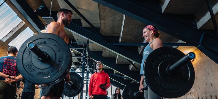 two people taking a CrossFit class with TeamUp 