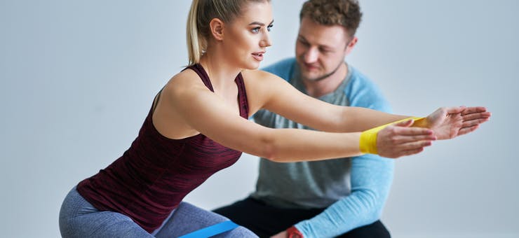 fitness instructor giving a personal training session