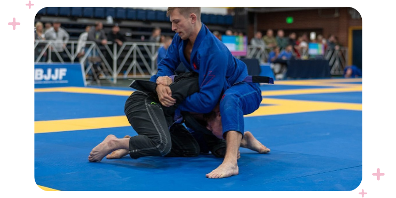 TeamUp's Tom Fischer puts an opponent in a kimura hold during a Brazilian Jiu Jitsu competition