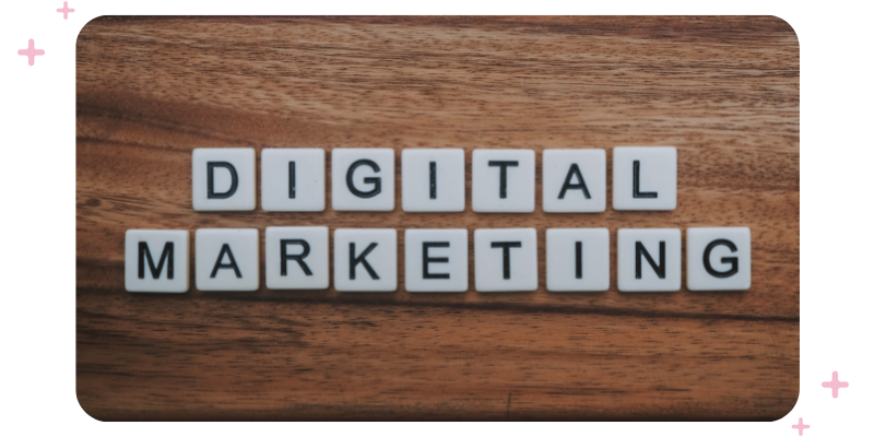 Digital marketing spelled out in blocks on a wooden table.