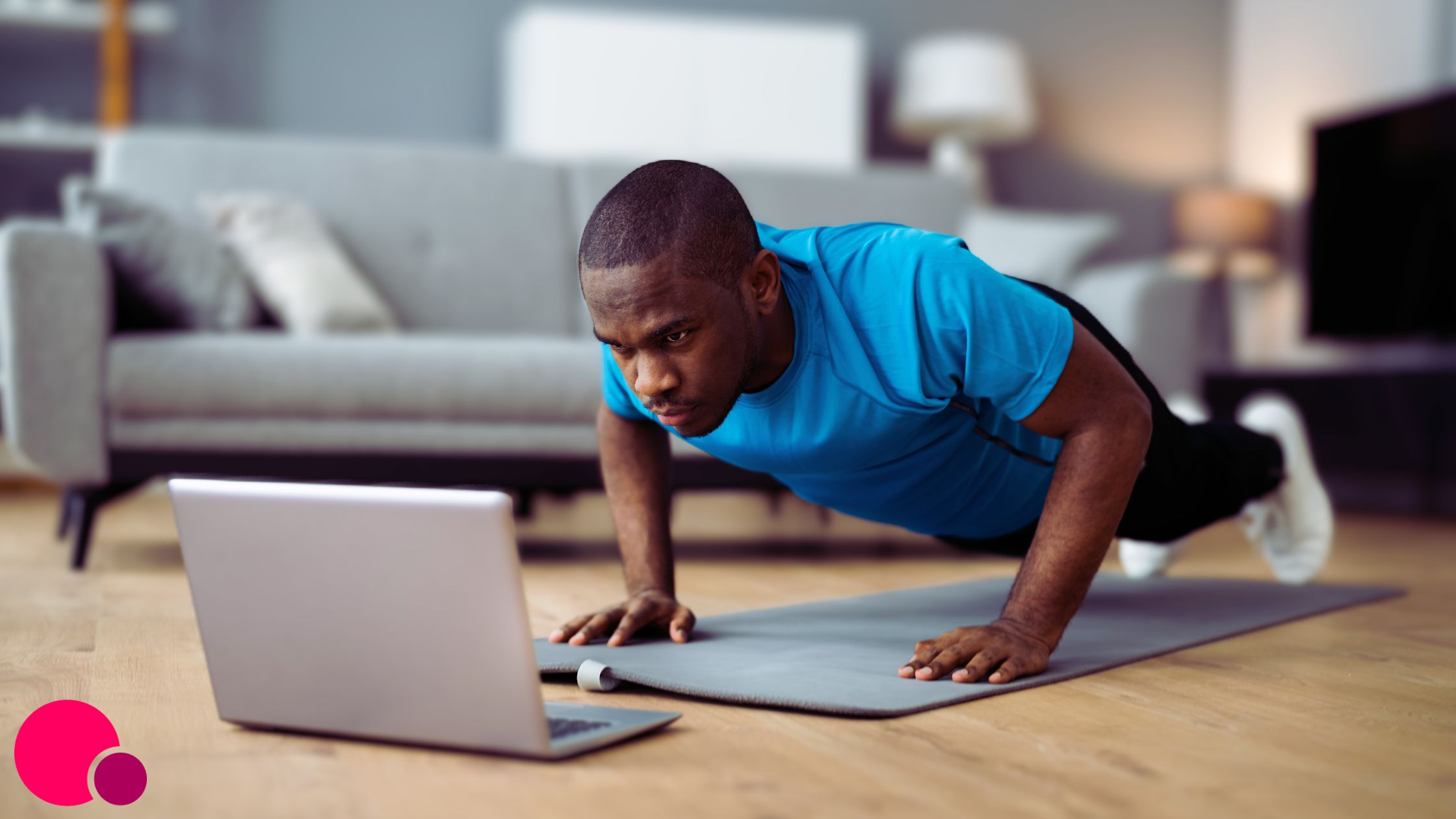 Someone holding a phone and typing on a computer, with an overlay of graphs and charts.