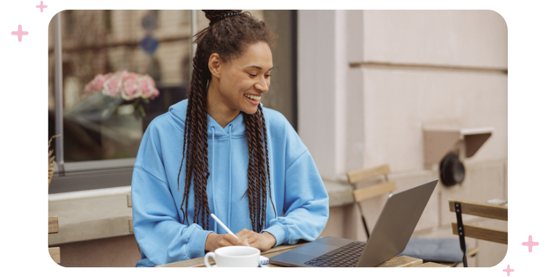 Fitness business owner working on her computer.