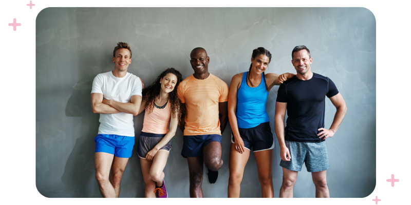 A group of people in workout clothes.