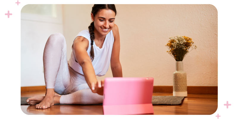 A teacher teaching an online yoga class.