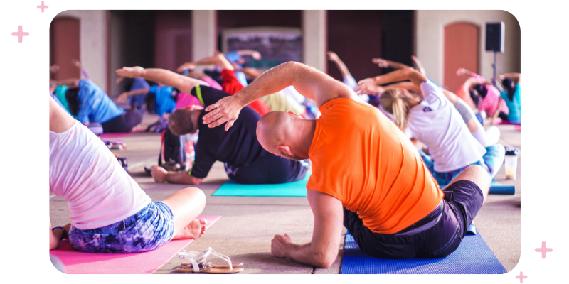 People doing yoga in the studio.